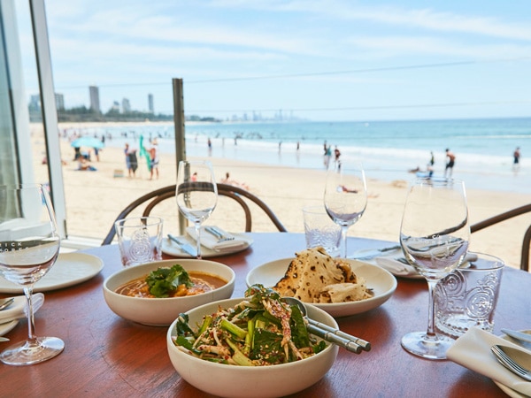 a dining setup on the beach at Rick Shores