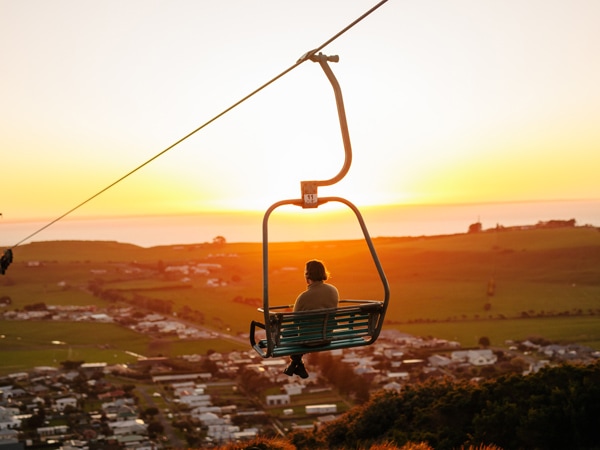 riding the The Nut Chairlift in Stanley at sunset