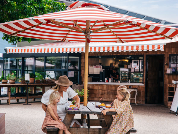 a family having brunch al fresco at Custard Canteen, Gold Coast cafes