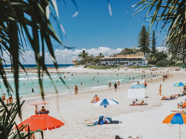 a view of Greenmount Beach filled with tourists on a sunny day