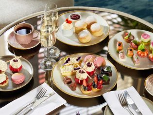 an array of desserts on the table at Chapter & Verse Bar and Lounge at JW Marriott