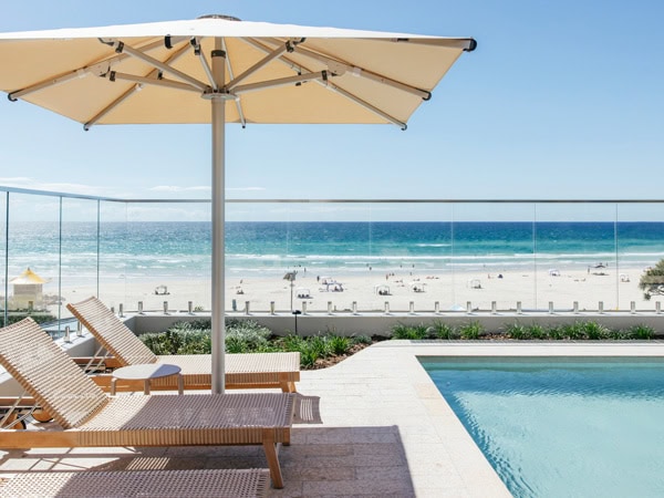 beach views by the pool at Kirra Point Holiday Apartments