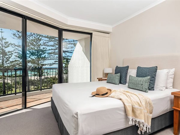 the bedroom with beach views at Mantra Coolangatta Beach