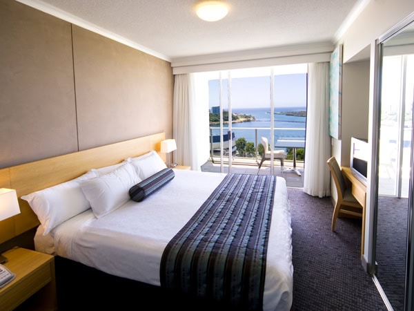 the bed with beach views at Mantra Twin Towns Coolangatta