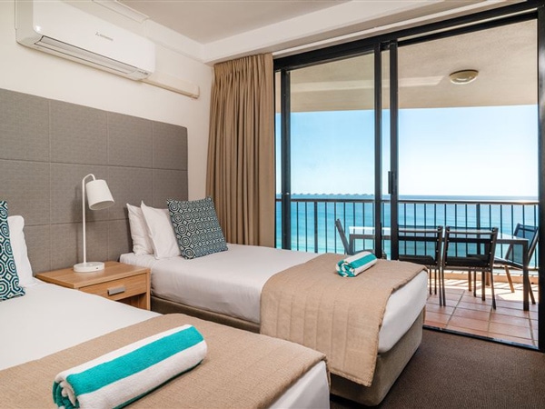 a look inside the deluxe ocean view bedroom apartment at Mantra Coolangatta Beach