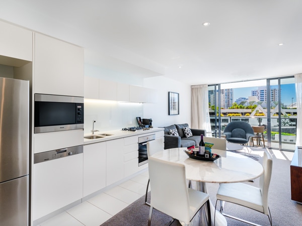 a dining area with modern amenities at Peppers Broadbeach