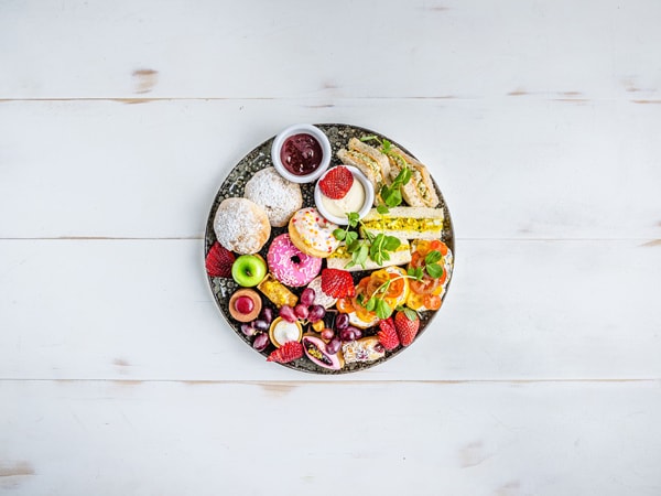 a fruit bowl on white background at SkyPoint Bistro + Bar at Q1