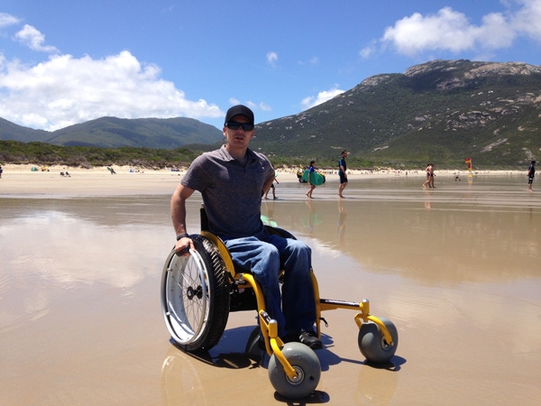 a person on a beach wheelchair