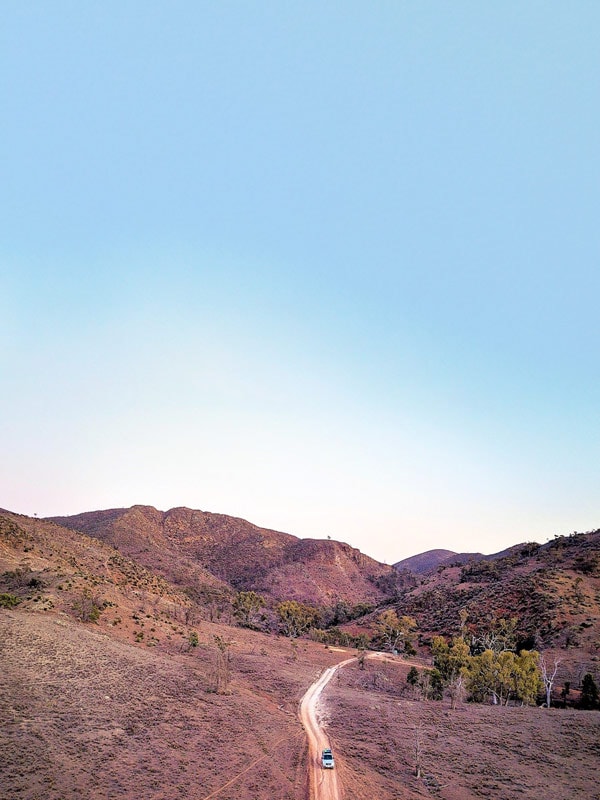 a car driving along the scenic Southern Flinders Ranges