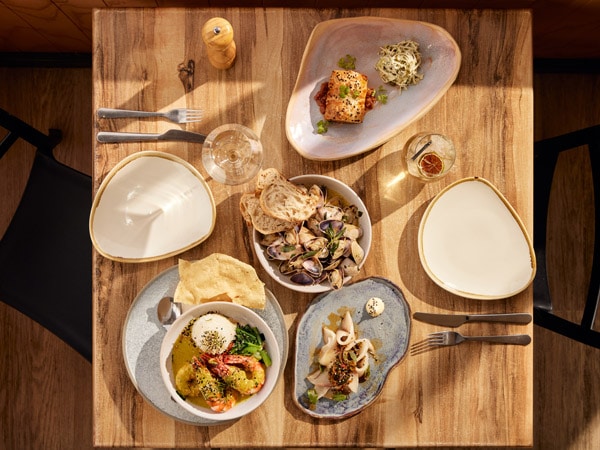 a table top view of the meals at Kuti Shack