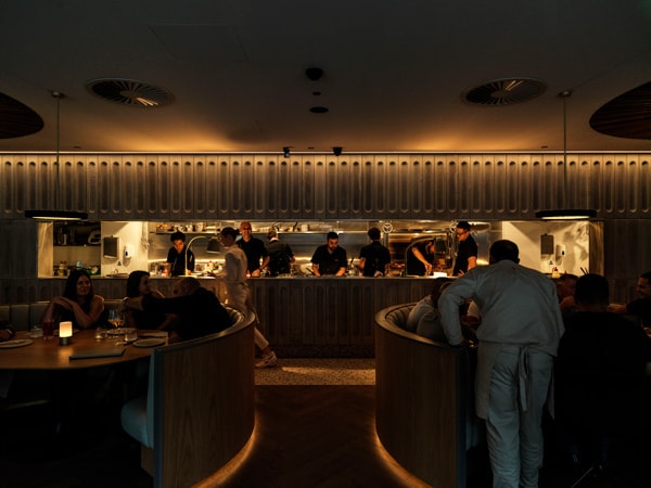 a dimly lit dining interior at Aalia, Sydney