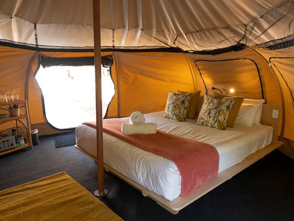 a look inside the Woodlands Glamping Tent at Cedar Creek Lodges