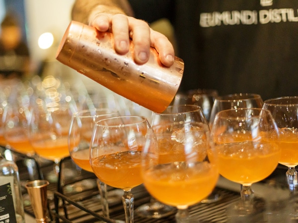 a bartender crafting Eumundi Distillers Folktale Gin cocktails