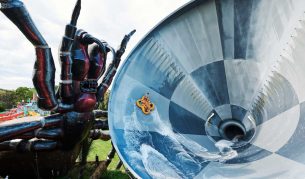 a huge spider sculpture at the Funnel Web thrill ride, Jamberoo Action Park