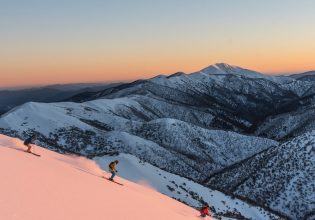 Skiers heading down slopes at Mount Hotham in Victoria