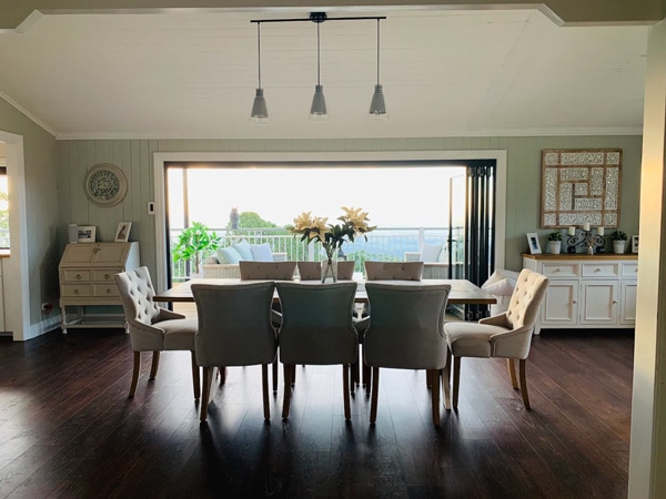 a dining table inside Mountaintop Queenslander Airbnb