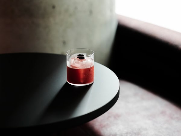 a cocktail drink on the table at Mu Omakase, Canberra