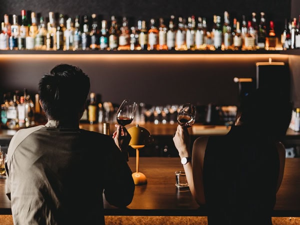 people sitting and drinking at the bar counter of Mu Omakase, Canberra