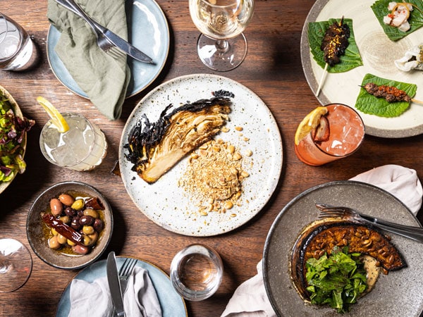 a spread of food on the table at Onzieme Restaurant, Canberra