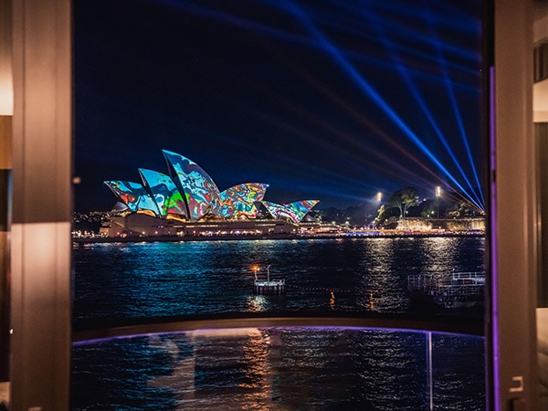 view of Vivid Sydney from Park Hyatt Sydney guest room balcony