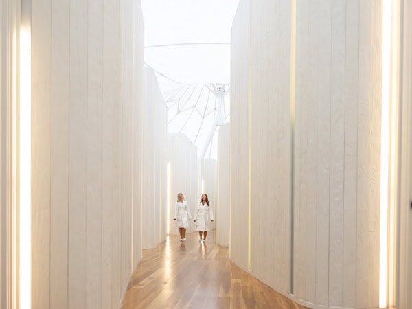 two women walking in robes at the spa, RACV Royal Pines Resort Gold Coast