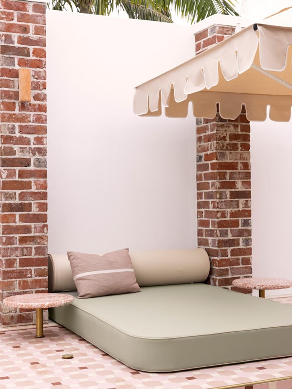 shaded day beds in The Banya