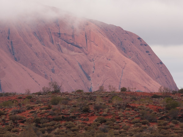 Rain clouds over Uluru