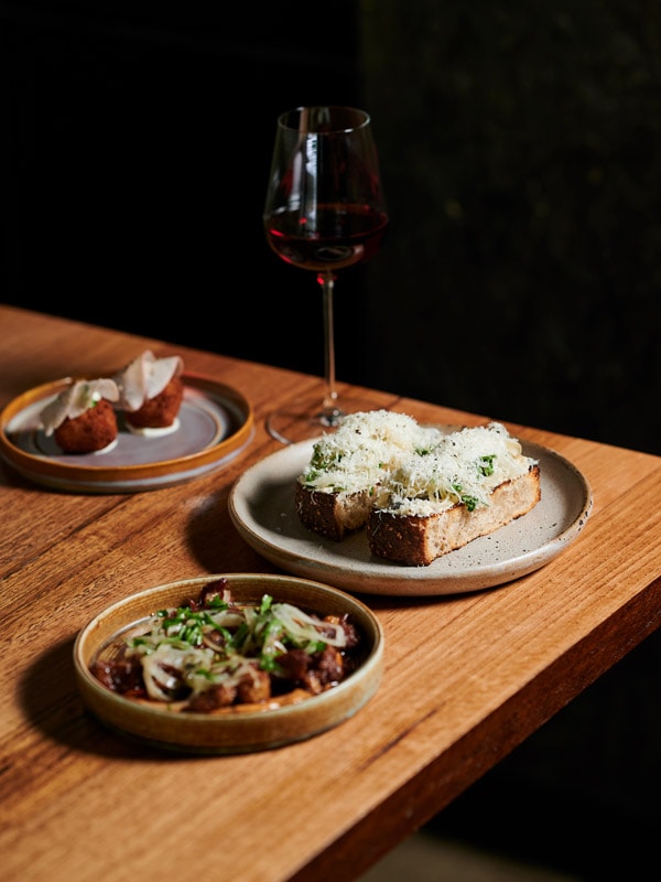 Red wine and three gourmet dishes from Terra in Canberra