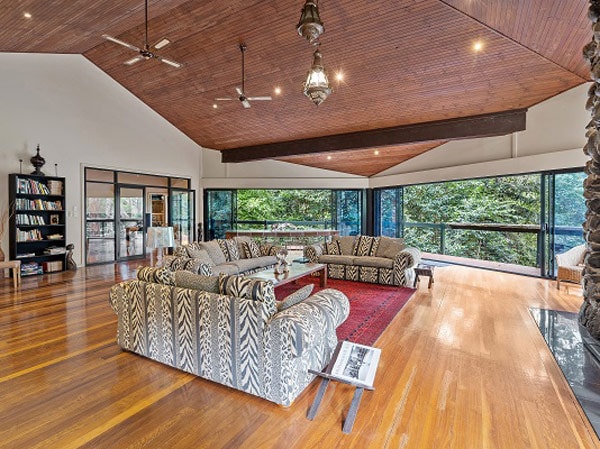 a huge couch inside The Escarpment Retreat