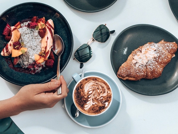 a table-top view of the menu at Cafe Le Monde, Noosa