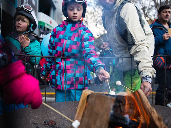 kids making Lindt Chocolate S'mores at Friday Flat Fire Pits