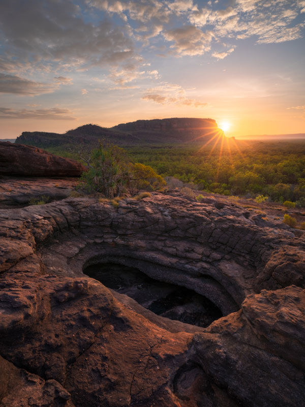a massive stone hole at Nourlangie Rock, Kakadu National Park