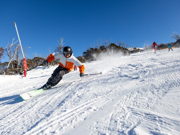 a person skiing at Thredbo Ski Resort