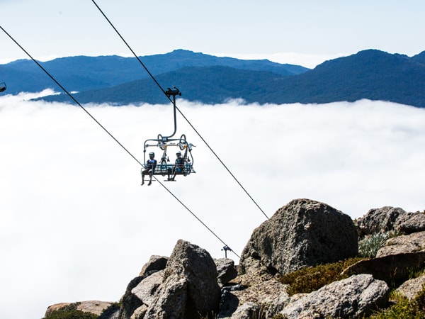 a chair lift heading to Thredbo Mountain Bike Park