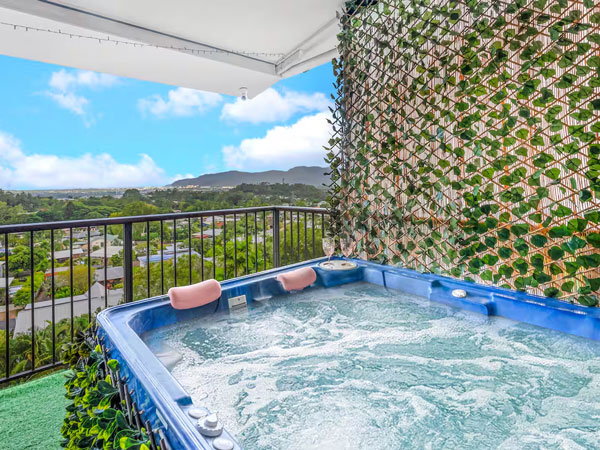 a private tub with a view at Sky High, Airbnb Cairns