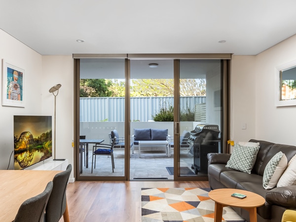 the living room interior with balcony at Bluewater Apartments, Kiama