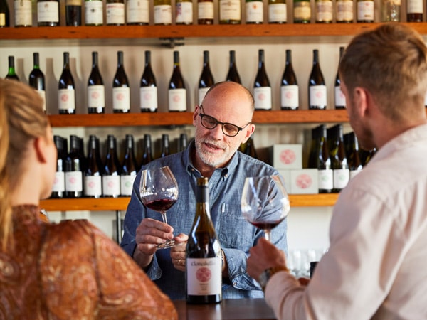 a couple enjoying a wine tasting experience at Clonakilla Wines, Murrumbateman