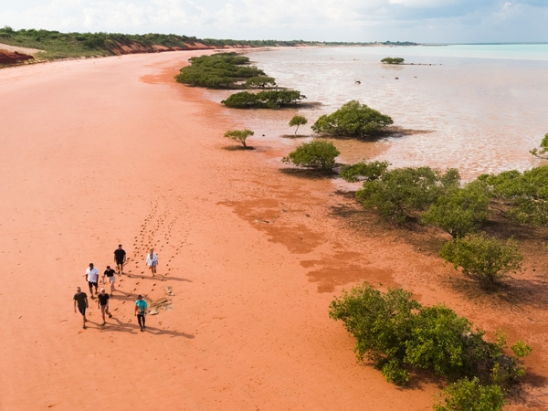 an aerial view of guests exploring Reddell Beach with Broome Dinosaur Adventures