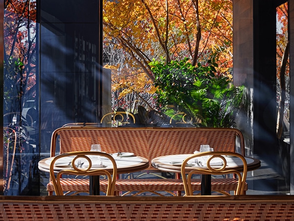 Louis Dining is all warm colours and leather lounges in Hotel Realm Canberra.