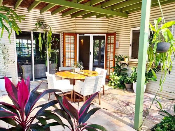 an outdoor dining area at El Sueno – The Dream airbnb in Broome