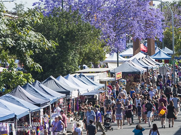 Crowds browsing through market stalls at the Grafton Jacaranda Festival 2016