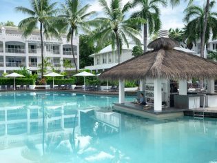 a poolside bar at Peppers Beach Club and Spa Palm Cove