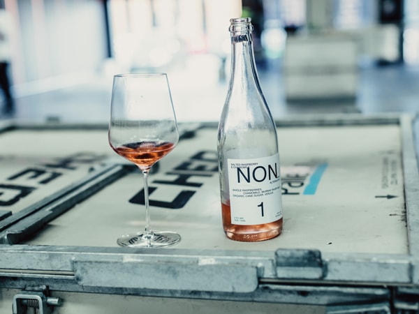 a glass and bottle of NON, Melbourne's first alcohol-free cellar door