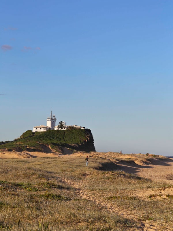 Views of Nobbys Lighthouse from the beach