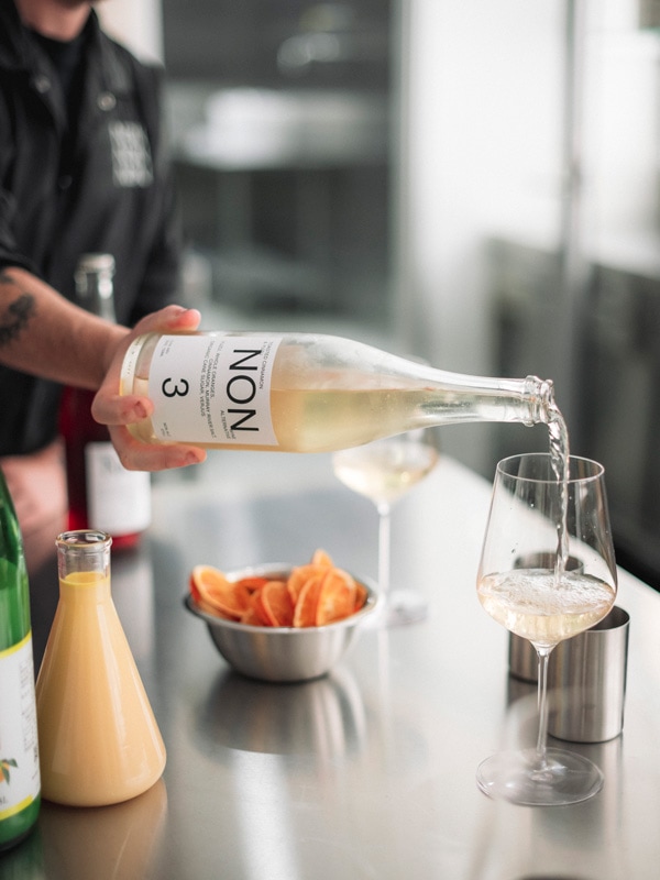 pouring NON 3 drink into a glass at Melbourne's first alcohol-free cellar door