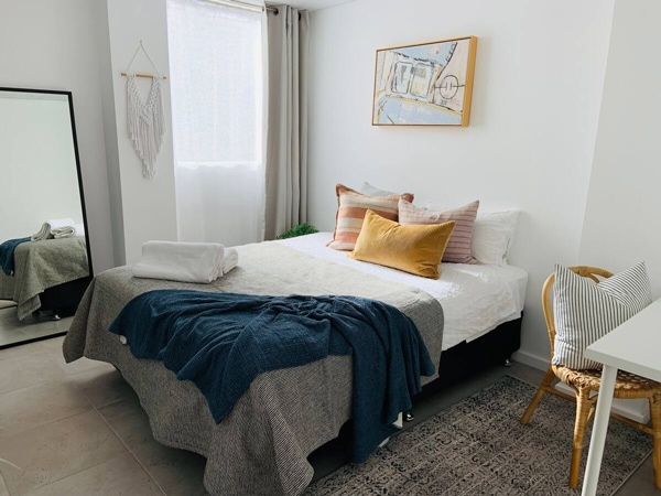 a cosy bedroom at Quiet Coastal Apartment, Kiama
