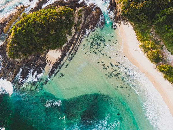 an aerial view of scenic waters off Number One Beach, Seal Rocks