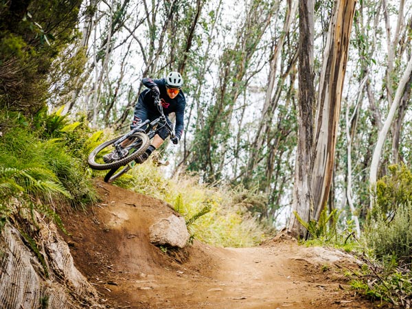 a person traversing MTB trails at Thredbo Mountain Bike Park