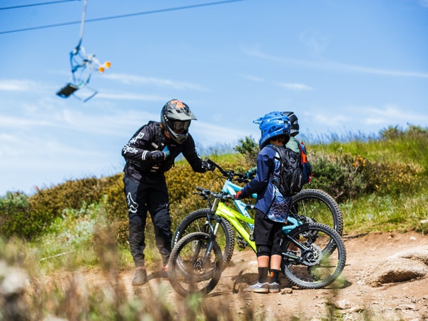 an instructor guiding kids at Thredbo Mountain Bike School