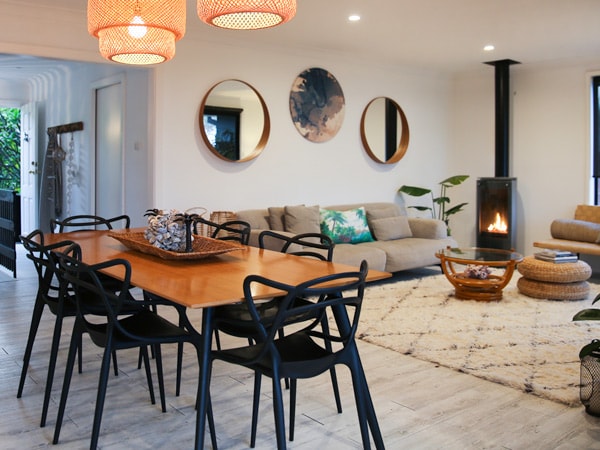 a living and dining interior at The Werri Shack, Kiama